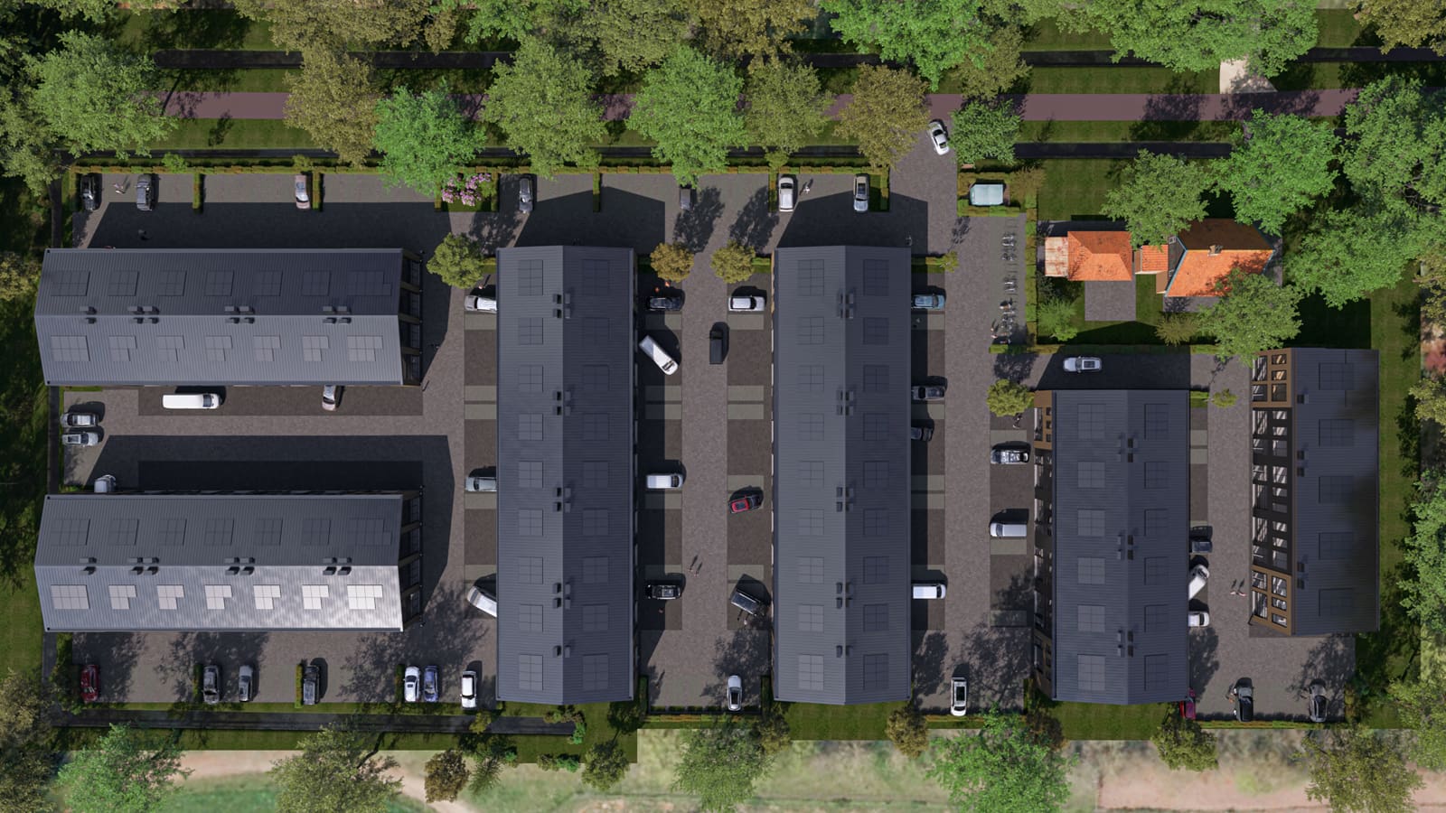 Luchtfoto van meerdere bedrijfsunits met parkeerruimte en omliggende bomen in Businesspark Soest, gezien vanuit de lucht nabij Baarn